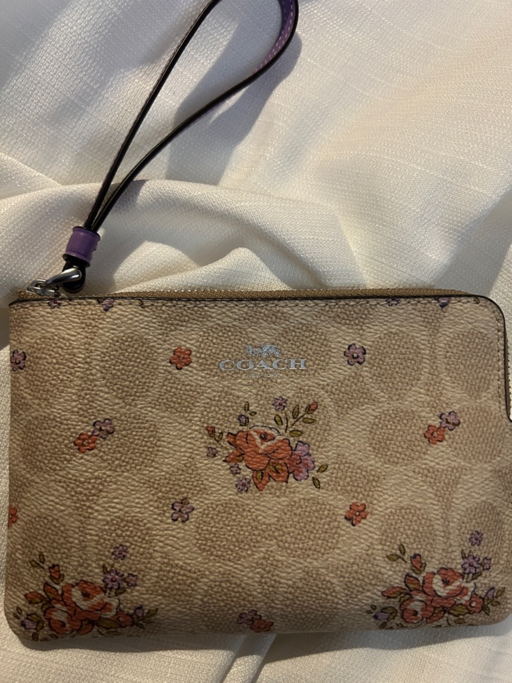 Coach Sand Multi Colored Floral Corner Zip Wristlet with Purple Strap Like New
